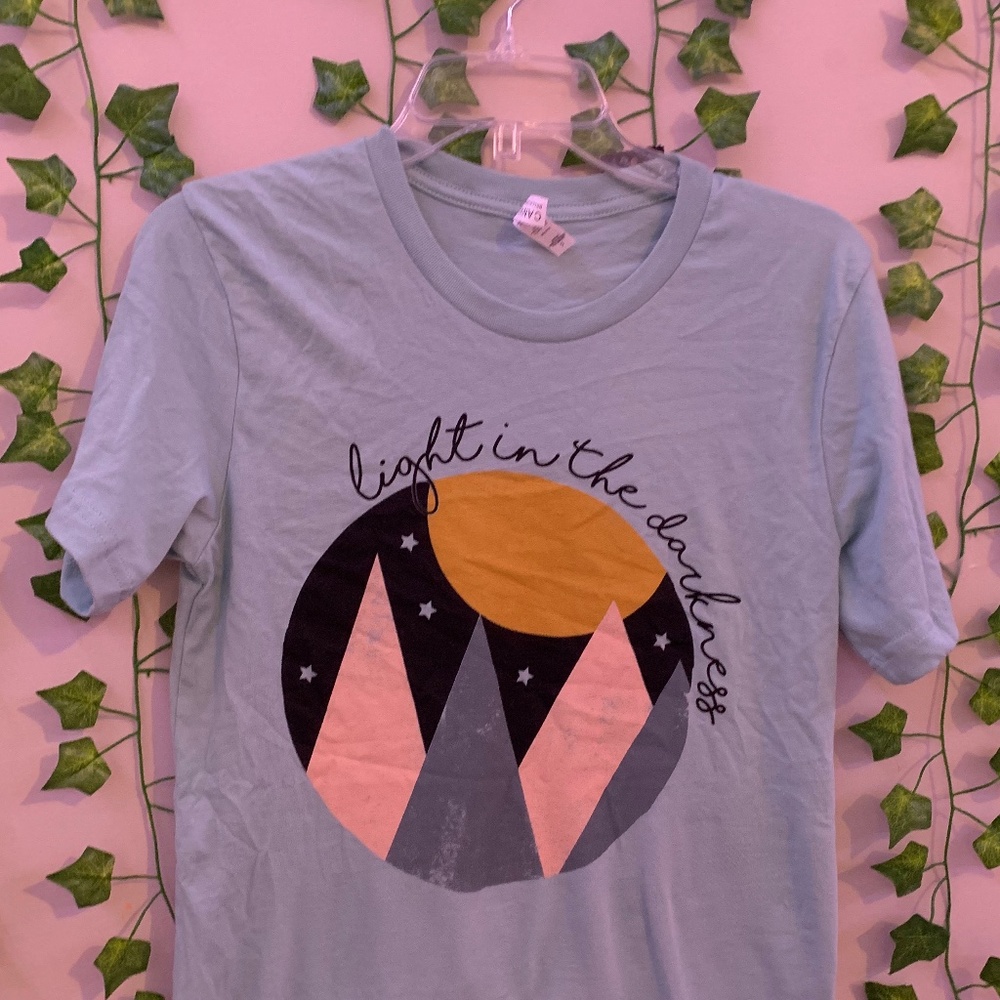 This is a faith collective shirt